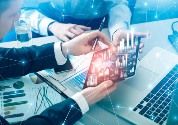 Teamwork with futuristic interface Teamwork with futuristic interface